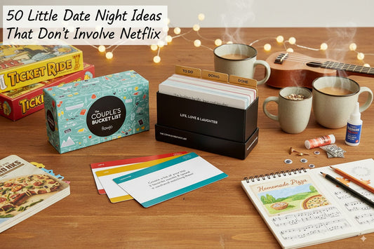 couples bucket list box filled with date ideas, on a table with mugs and books, and puzzles.