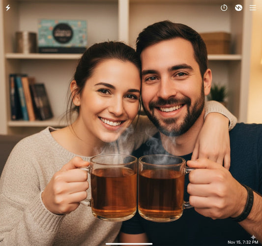 Couple posing with apple cider on fall date with couples bucket list in the background